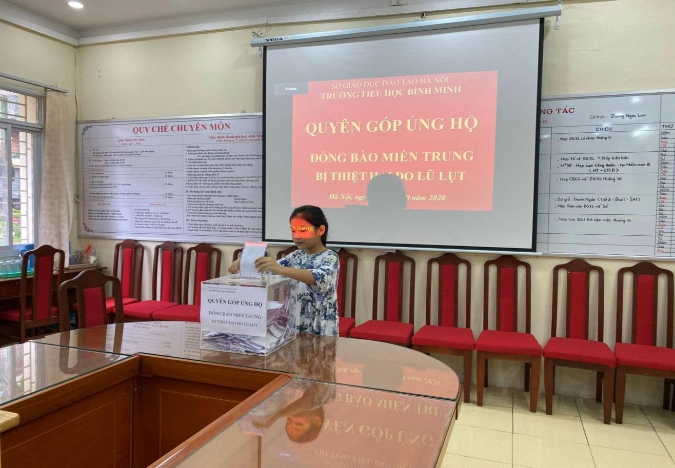 Trường tiểu học Bình Minh phát động ủng hộ người dân miền trung vượt qua mưa lũ. 6